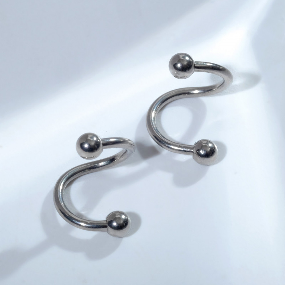 Пирсинг в бровь «Спираль»