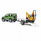 Внедорожник "Land Rover Defender" c прицепом-платформой, гусеничным мини экскаватором и рабочим