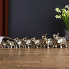 Набор сувениров «Семь слонов в попонах с пышным цветком»