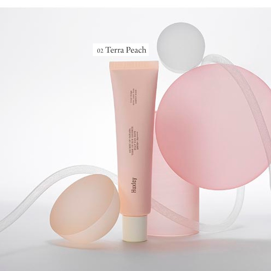 Лёгкая увлажняющая солнцезащитная эссенция «Terra Peach» SPF 50 | Huxley
