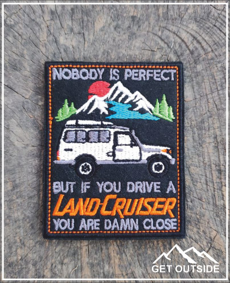 Шеврон «Nobody is perfect, but if you drive a Land Cruiser, you are damn close. Никто не совершенен, но если ты за рулем Ленд Крузера, ты чертовски близок к этому!» | Get Outside