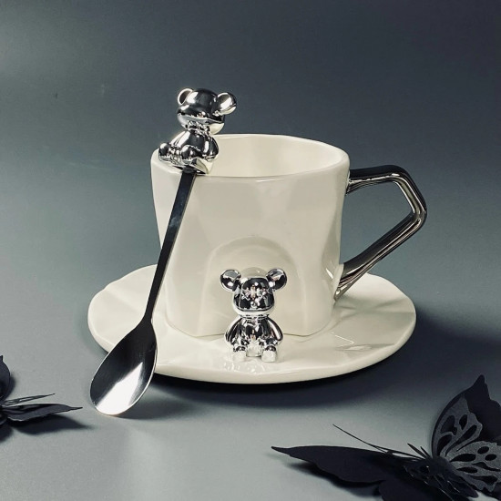 Чашка с блюдцем и ложкой