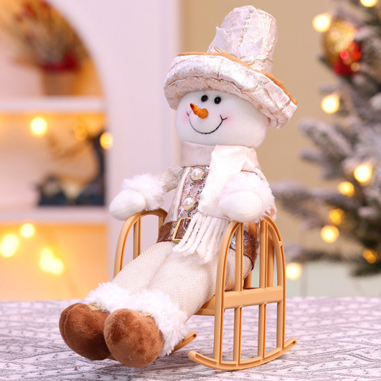 Фигурка декоративная «Снеговик в кресле-качалке»