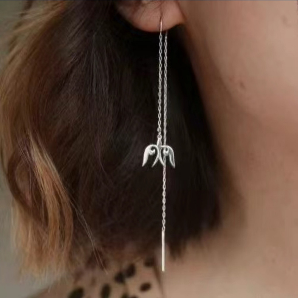 Этнические серьги-протяжки с подвеской в виде стилизованных крыльев