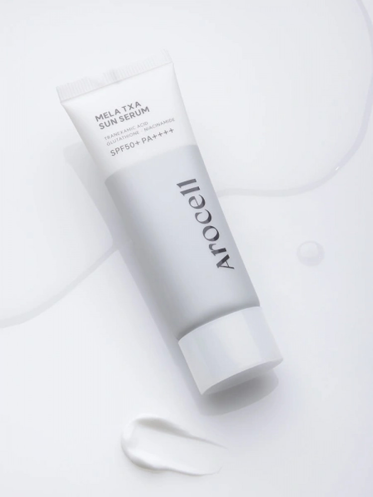 Солнцезащитная сыворотка с транексамовой кислотой, мелатонином и глутатионом SPF50 + | Arocell