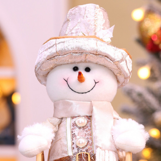 Фигурка декоративная «Снеговик в кресле-качалке»