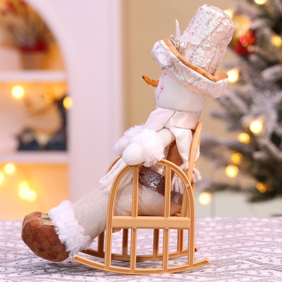 Фигурка декоративная «Снеговик в кресле-качалке»