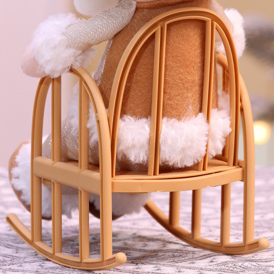 Фигурка декоративная «Снеговик в кресле-качалке»