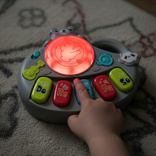 Развивающая игрушка «Музыкальный мишка»