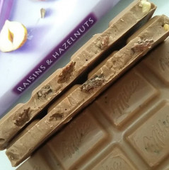 Шоколад Milka «Raisin and nut» - Фото 2