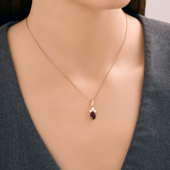 Подвеска из из золочёного серебра с гранатом и фианитами