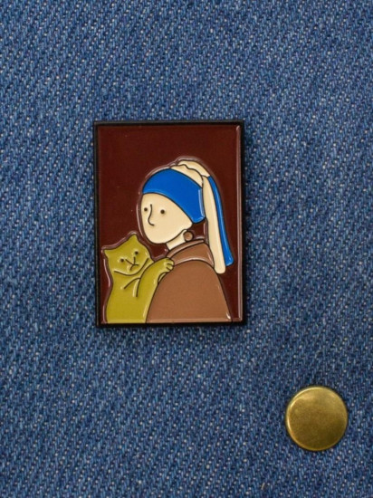 Значок «Girl with the orange cat»