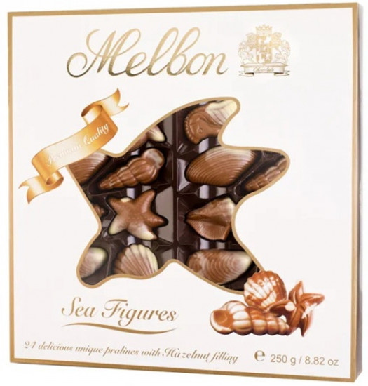 Шоколадные ракушки «Pralines from milk & white chocolate with Hazelnut filling»
