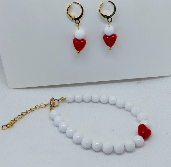 Комплект украшений из браслета и сережек