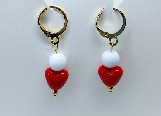 Комплект украшений из браслета и сережек