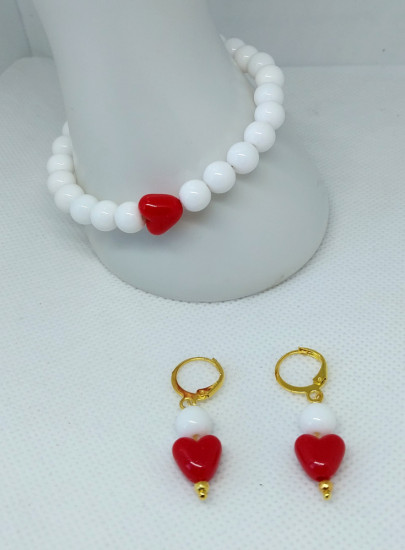 Комплект украшений из браслета и сережек