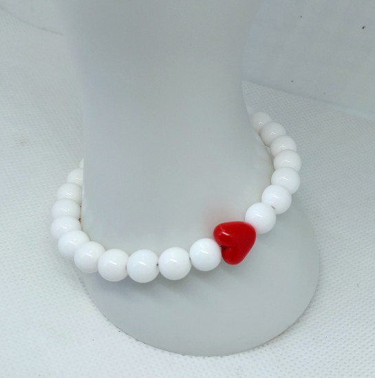 Комплект украшений из браслета и сережек