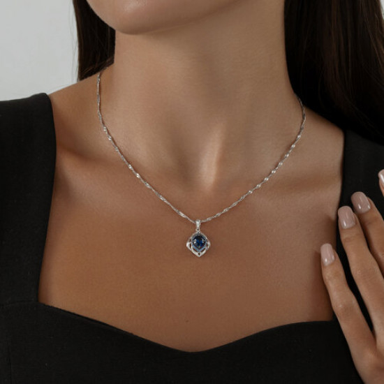 Подвеска из серебра с корундом сапфировым и фианитами