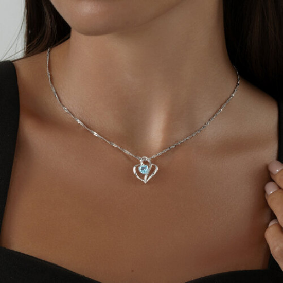 Подвеска из серебра с топазом и фианитами