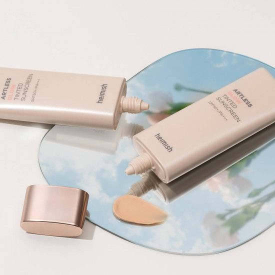 Крем для лица с сияющим финишем тонирующий «Artless Glow Tinted Sunscreen» SPF50+ PA+++
